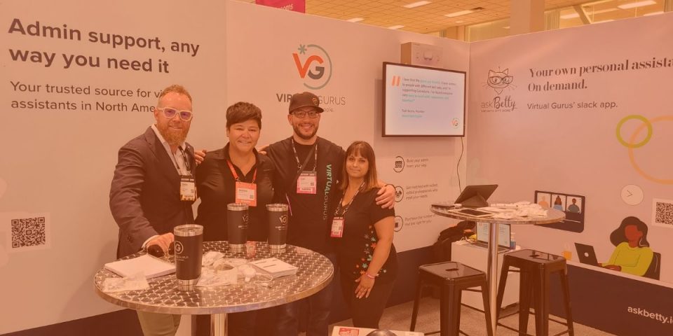 Four members of the Virtual Gurus team at our booth at the Collision Conference