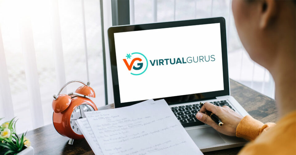 Virtual Gurus Webinar, virtual assistant sitting in front of a laptop working from their home office.